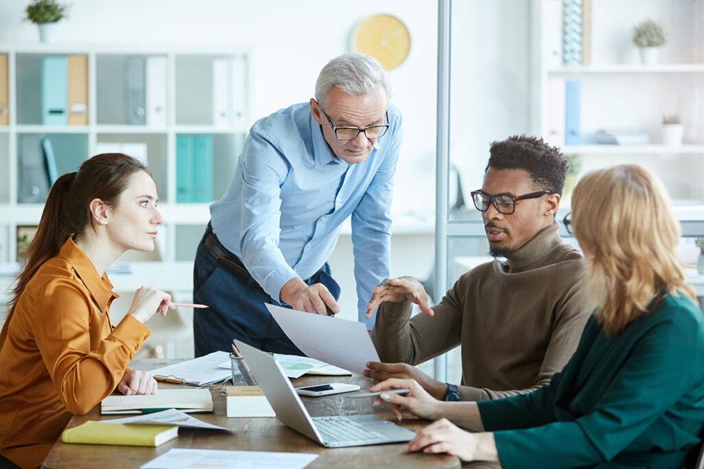 Group collaborating in a meeting room.